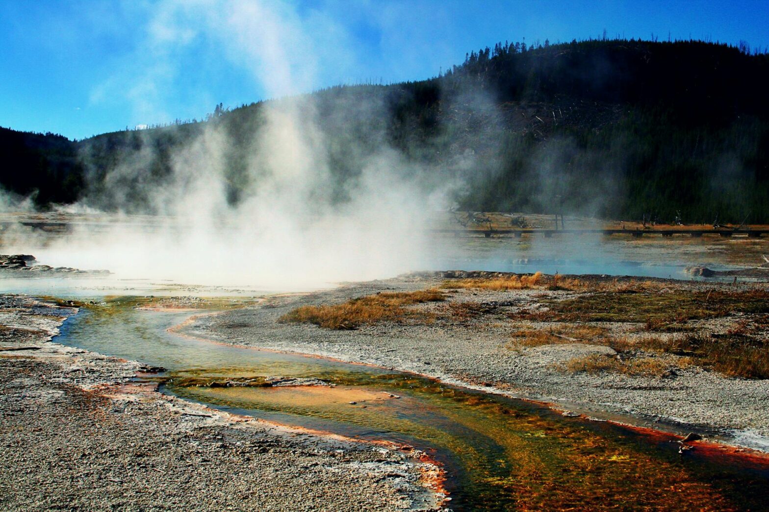 body of water and smoke